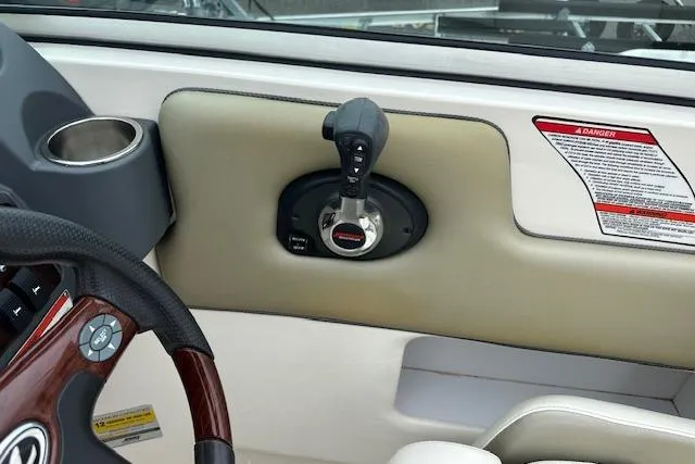 Slide: The Image of 2007 Sea Ray 260 Sundeck boat throttle control and dashboard detail. - 6