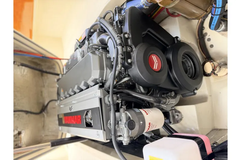 Slide: The Image of Engine of a 2003 Hinckley Picnic Boat EP, featuring Yanmar components. - 1