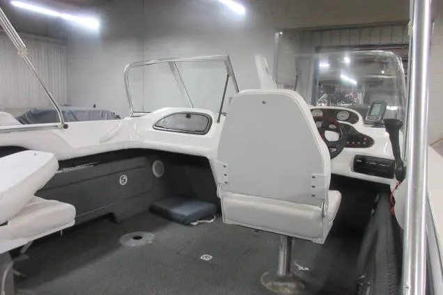 Slide: The Image of 2003 Sylvan V180 Viper OB boat interior with steering console and seating. - 11