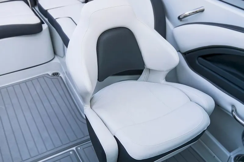 Slide: The Image of 2024 Crownline Eclipse E235 SURF boat seat, featuring sleek white and black design. - 7