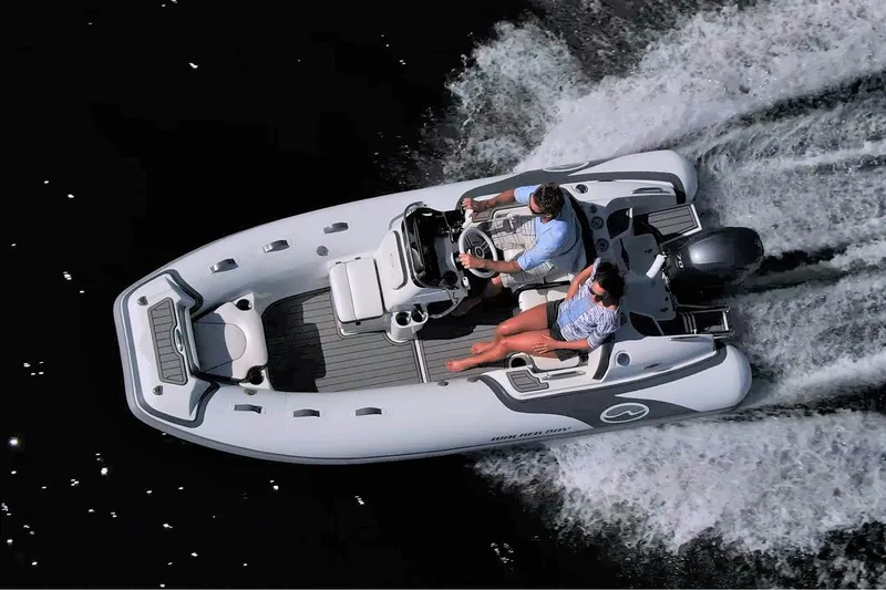 Slide: The Image of Manufacturer Provided Image: 2022 Walker Bay Venture 14 boat cruising on water. - 7