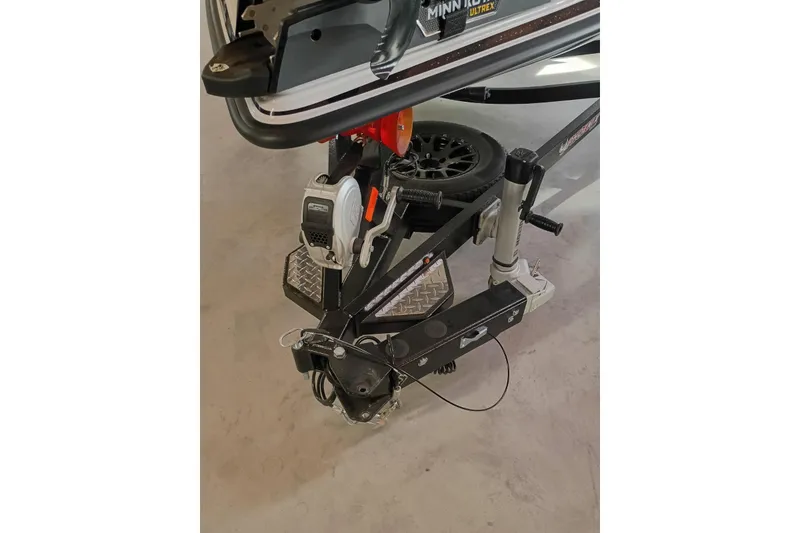 Slide: The Image of 2026 Phoenix 921 Elite X boat trailer hitch with Minn Kota Ultrex motor. - 10