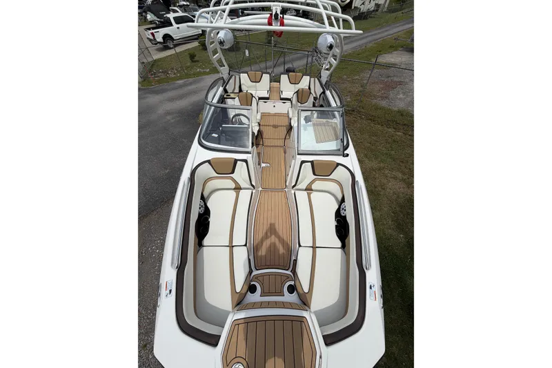 Slide: The Image of 2022 Yamaha Boats 252SE with sleek interior and modern design. - 2