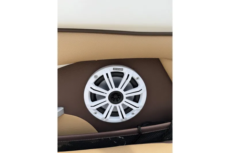 Slide: The Image of Speaker system on 2022 Yamaha Boats 252SE, featuring a sleek white and brown design. - 8