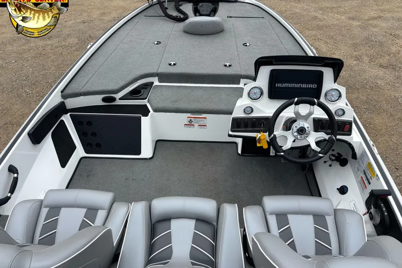 Slide: The Image of 2024 Nitro Z18 boat interior with steering wheel and Humminbird display. - 5