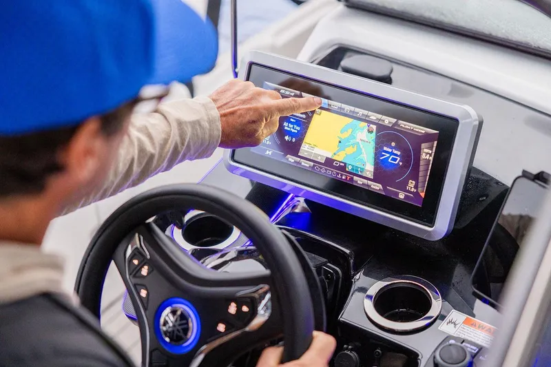 Slide: The Image of Manufacturer Provided Image: 2026 Yamaha Boats 252SD dashboard with touchscreen navigation system and steering wheel. - 12