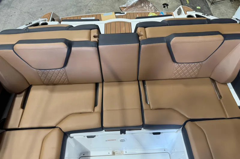 Slide: The Image of 2026 Yamaha Boats 252SD interior with luxurious tan leather seating and diamond stitching. - 3