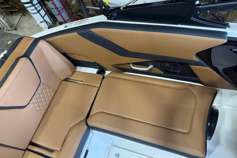 Slide: The Image of 2026 Yamaha Boats 252SD interior with tan leather seating and modern design. - 4