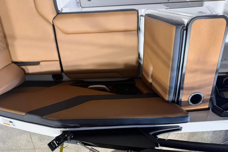 Slide: The Image of 2026 Yamaha Boats 252SD interior seating with tan and black upholstery. - 5