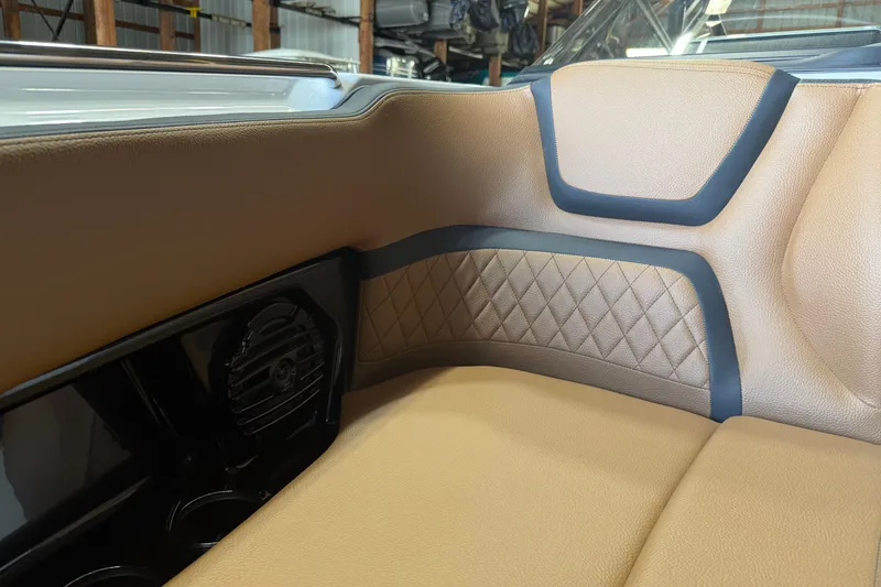 Slide: The Image of Luxurious interior seating of 2026 Yamaha Boats 252SD with diamond-stitched upholstery. - 9