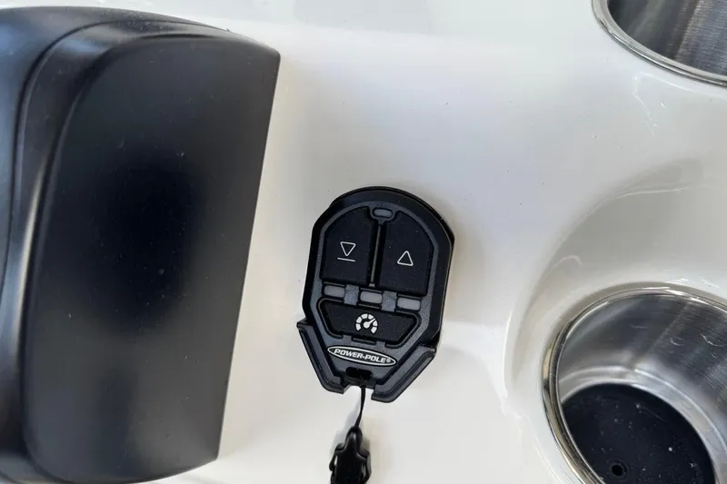 Slide: The Image of Control panel on 2026 Key West 230 Bay Reef boat dashboard with cup holder. - 27
