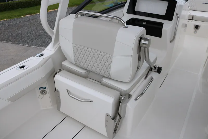 Slide: The Image of Luxurious seating on 2026 World Cat 265 DC-X boat, featuring elegant white upholstery and modern design. - 13
