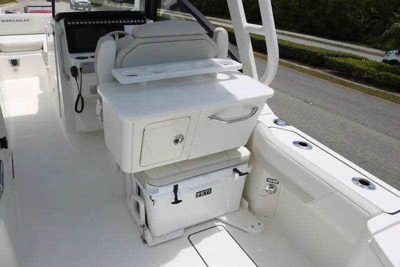 Slide: The Image of Interior of 2026 World Cat 265 DC-X boat with seating and storage. - 14