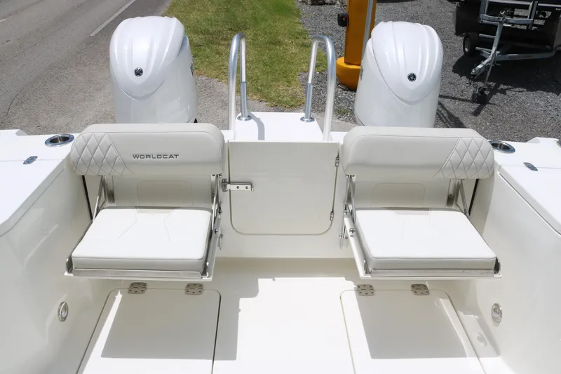 Slide: The Image of 2026 World Cat 265 DC-X boat with dual seats and outboard motors. - 20
