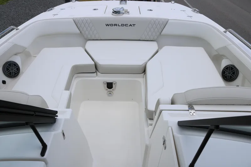 Slide: The Image of Interior view of 2026 World Cat 265 DC-X boat, featuring spacious seating and modern design. - 8