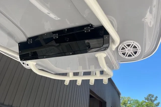 Slide: The Image of 2026 Key West 239 FS boat underside with rod holders and speakers. - 13