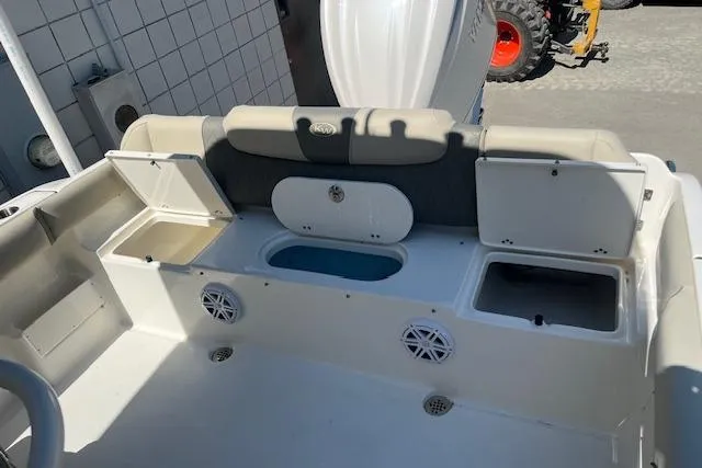 Slide: The Image of 2026 Key West 239 FS boat interior with storage compartments and seating. - 9