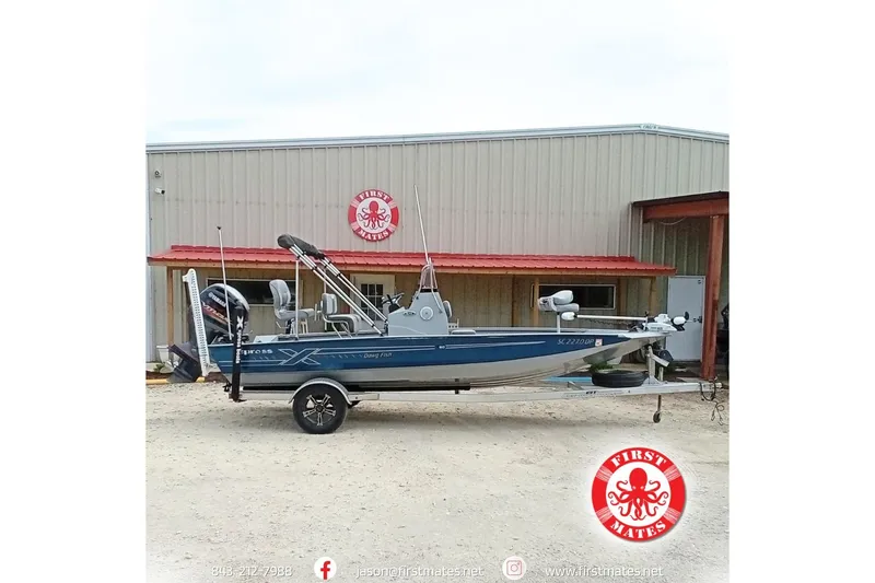 The Image of 2021 Xpress H20B Bay boat on trailer outside First Mates building. - 1