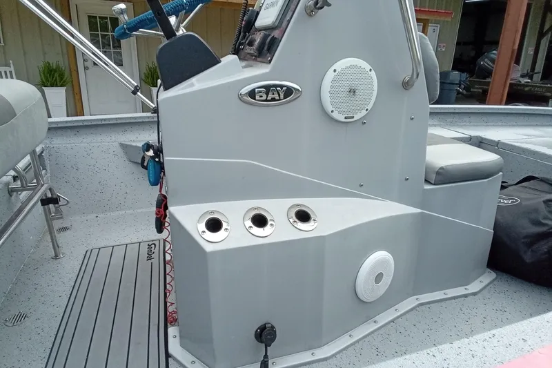 Slide: The Image of 2021 Xpress H20B Bay boat console with seating and speaker system. - 14