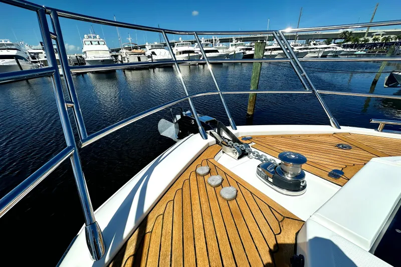 Slide: The Image of Bow view of 2015 Azimut 55S yacht docked at marina. - 7