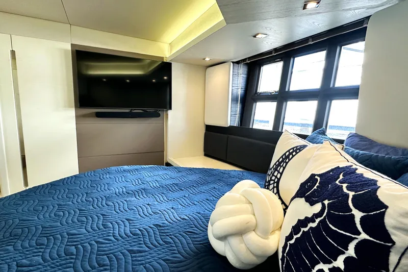 Slide: The Image of Luxurious bedroom interior of 2015 Azimut 55S yacht with modern decor and large windows. - 26
