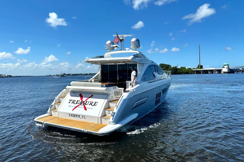 Slide: The Image of Azimut 55S 2015 yacht cruising in Tampa, Florida waters under a clear blue sky. - 3