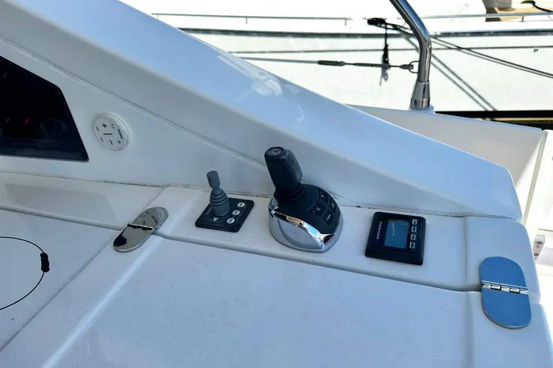 Slide: The Image of Control panel of a 2015 Azimut 55S yacht with joystick and display. - 12