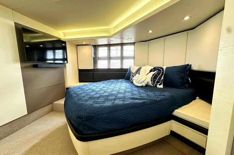 Slide: The Image of Luxurious bedroom interior of 2015 Azimut 55S yacht with modern decor and flat-screen TV. - 28
