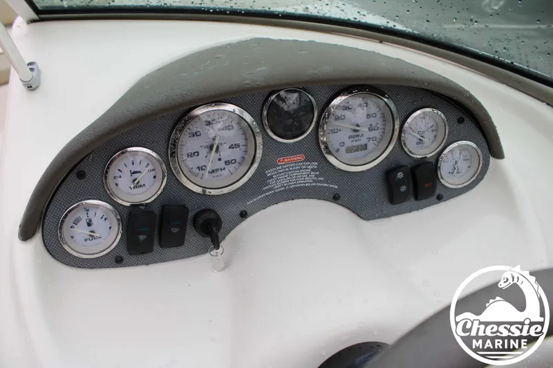 Slide: The Image of Dashboard of a 2005 Sea Ray 180SPBR boat. - 11