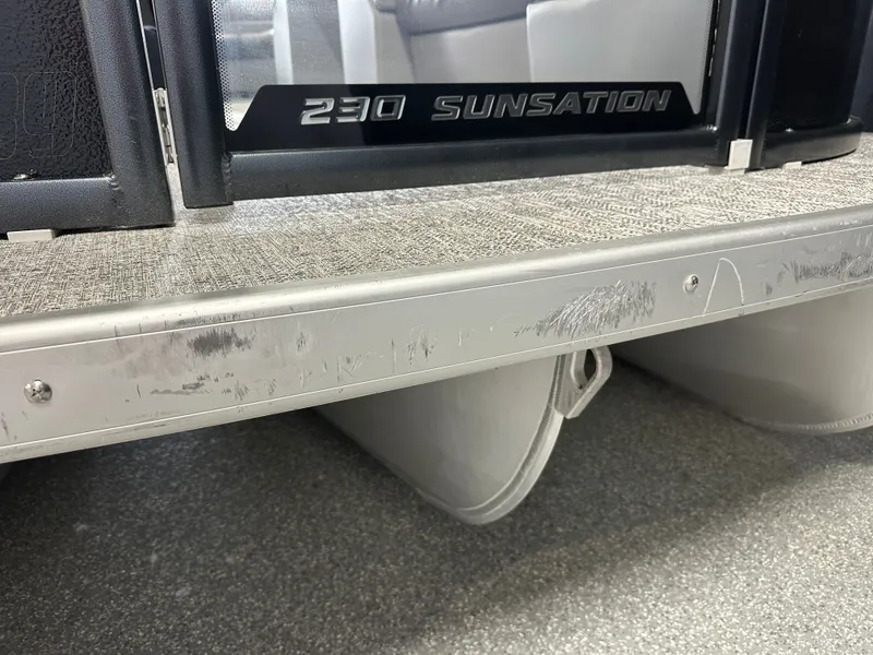 Slide: The Image of Close-up of 2024 Premier 230 Sunsation TRITOON with scratches on the frame. - 11