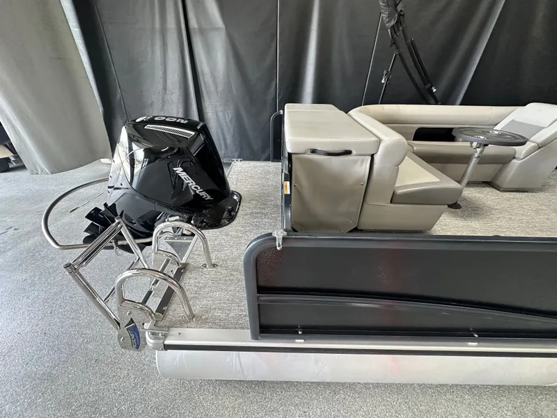 Slide: The Image of 2024 Premier 230 Sunsation TRITOON with Mercury engine and luxurious seating. - 2