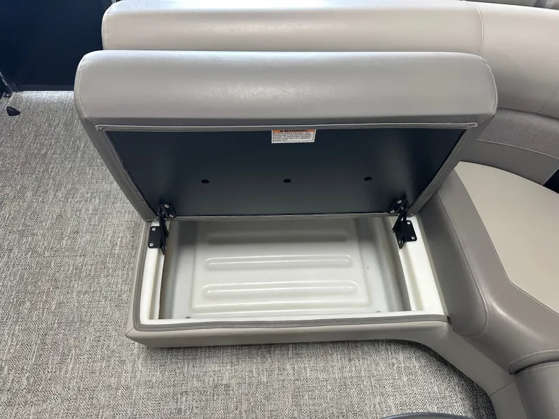 Slide: The Image of 2024 Premier 230 Sunsation TRITOON seat with storage compartment. - 29