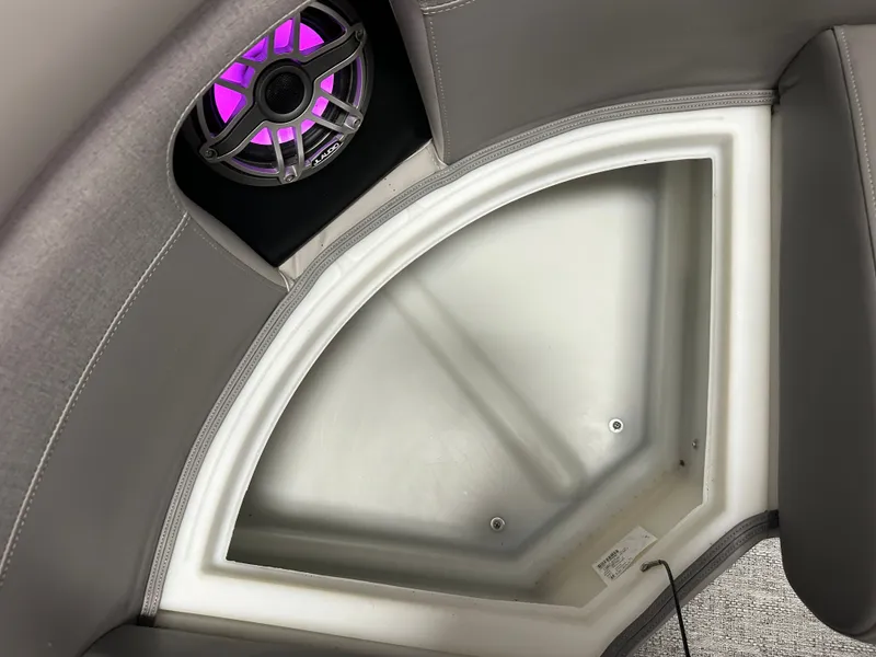 Slide: The Image of Speaker and storage area in Premier 230 Sunsation TRITOON 2024. - 31