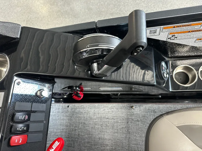 Slide: The Image of Control console of 2024 Premier 230 Sunsation TRITOON with controls. - 45