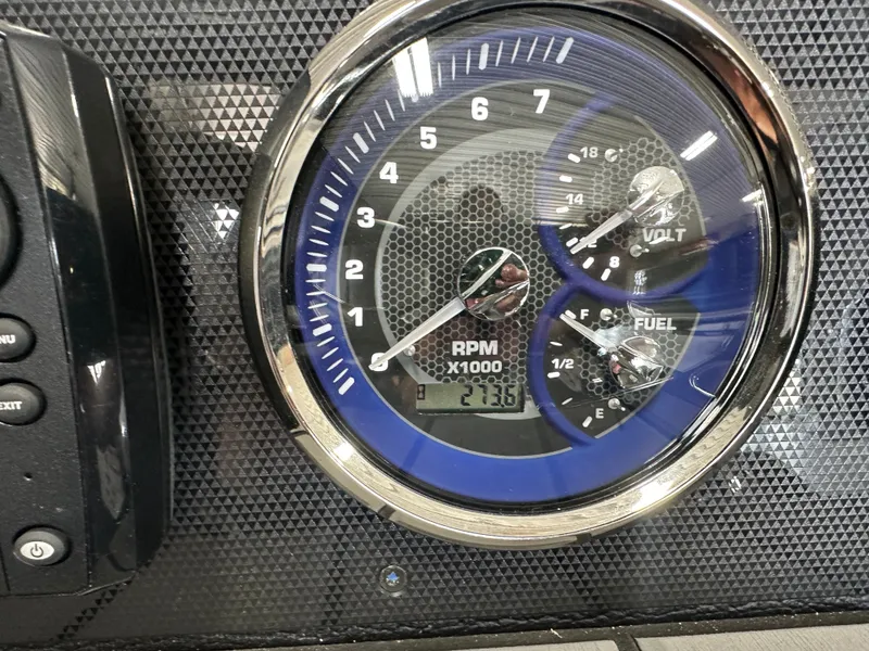 Slide: The Image of Tachometer and gauges of the 2024 Premier 230 Sunsation TRITOON. - 48