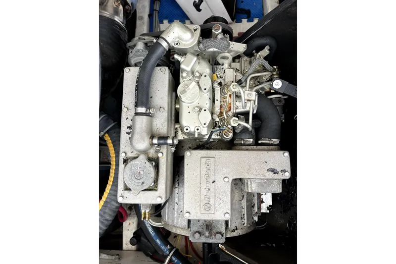 Slide: The Image of Engine of a 1999 Tiara Yachts 3500 Open, showcasing mechanical components. - 41