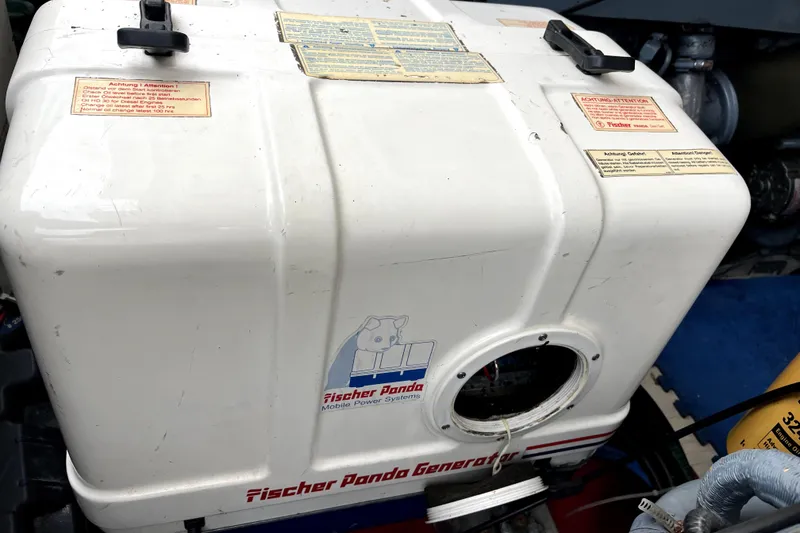Slide: The Image of Fischer Panda generator in a 1999 Tiara Yachts 3500 Open engine room. - 40