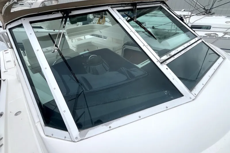 Slide: The Image of 1999 Tiara Yachts 3500 Open boat windshield and cockpit view. - 45