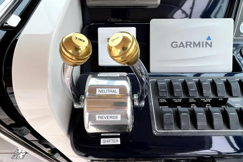 Slide: The Image of Control panel of a 1999 Tiara Yachts 3500 Open with Garmin navigation system. - 29