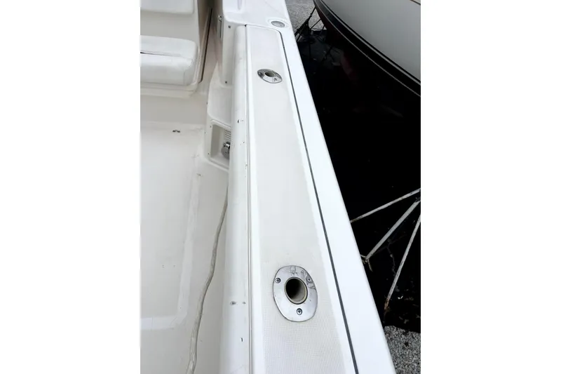 Slide: The Image of 1999 Tiara Yachts 3500 Open deck detail with rod holders. - 32