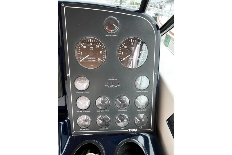 Slide: The Image of 1999 Tiara Yachts 3500 Open dashboard with gauges and controls. - 30