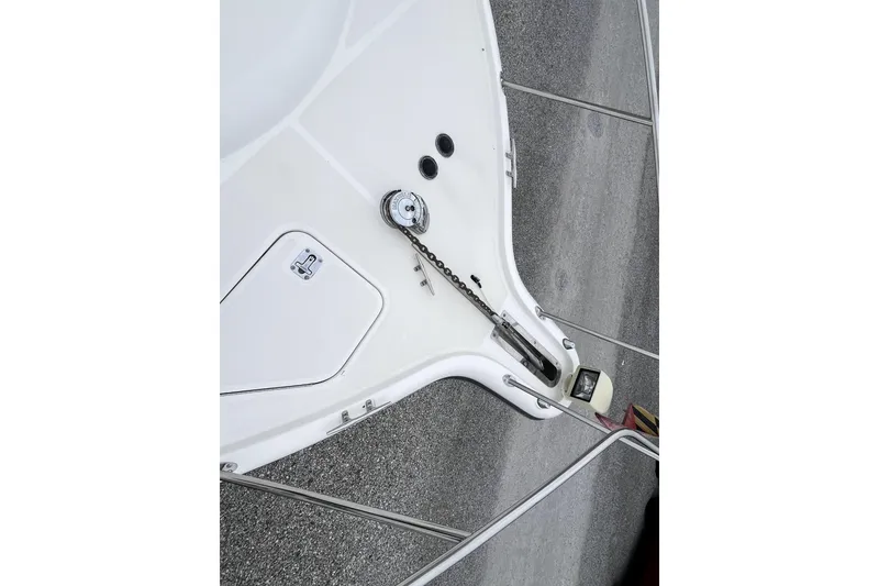 Slide: The Image of Bow of 1999 Tiara Yachts 3500 Open with anchor chain and deck fittings. - 33