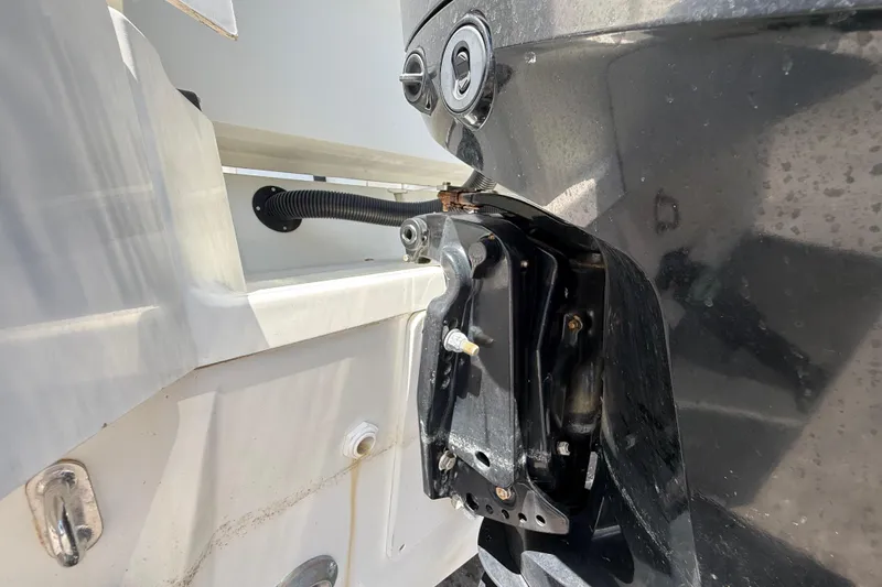Slide: The Image of Close-up of Jeanneau NC 895 boat engine components, 2021 model, showing mechanical details. - 16