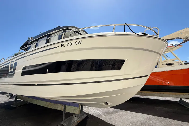 Slide: The Image of 2021 Jeanneau NC 895 boat on display, showcasing sleek design and modern features. - 3