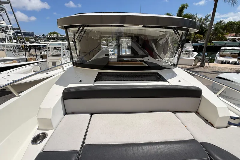 Slide: The Image of 2021 Jeanneau NC 895 boat with spacious deck and modern design in marina setting. - 33