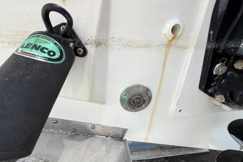 Slide: The Image of Close-up of Jeanneau NC 895 boat's Lenco trim tab and fittings, 2021 model. - 48