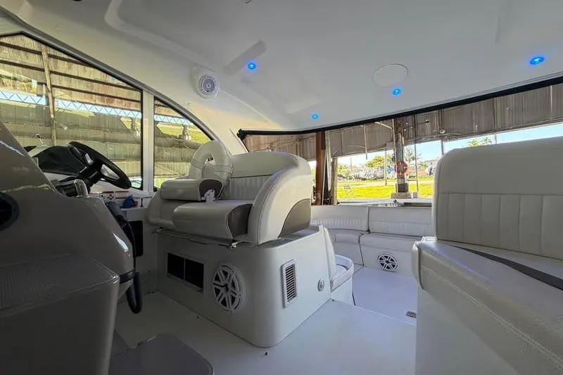 Slide: The Image of Interior of 2012 Cruisers Yachts 430 Sports Coupe with luxurious seating and modern design. - 10