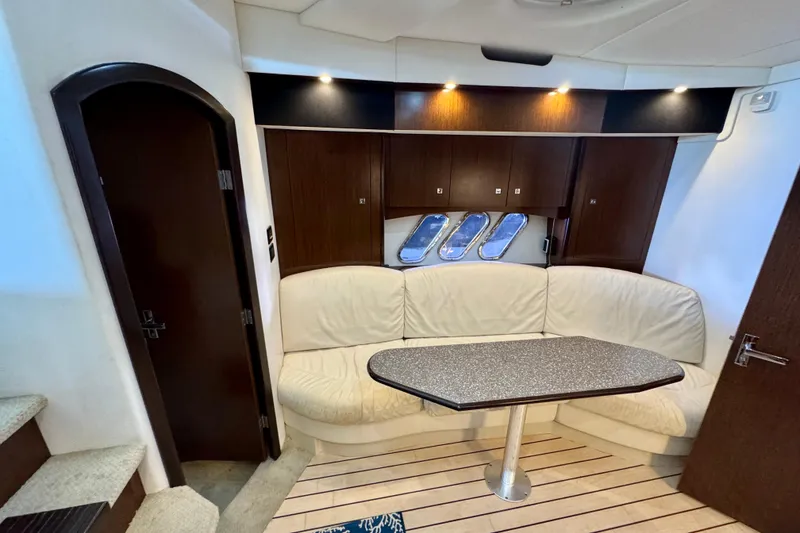 Slide: The Image of Luxurious interior of 2012 Cruisers Yachts 430 Sports Coupe with elegant seating and table. - 12