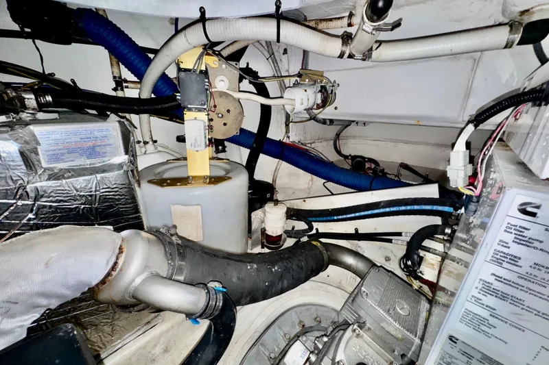 Slide: The Image of Engine room of 2012 Cruisers Yachts 430 Sports Coupe with visible mechanical components. - 21