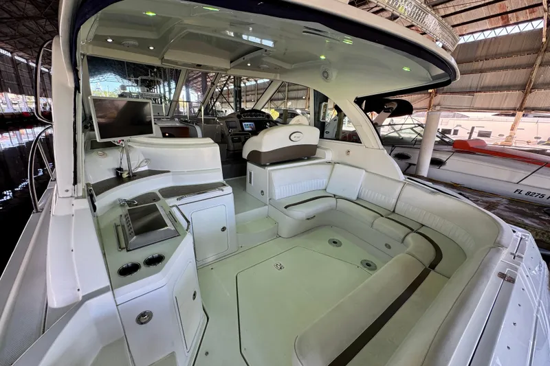 Slide: The Image of 2012 Cruisers Yachts 430 Sports Coupe interior with seating and entertainment area. - 4